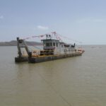 Ethiopian Dam - a large boat floating on top of a large body of water