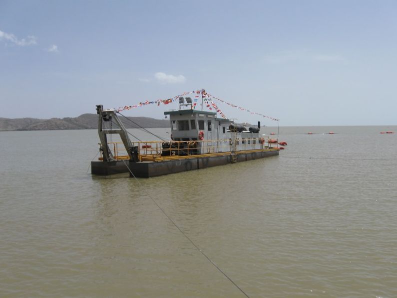 Ethiopian Dam - a large boat floating on top of a large body of water