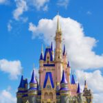 Lotte World - white and blue castle under blue sky during daytime