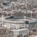 Melbourne Cricket - an aerial view of a soccer stadium in a city