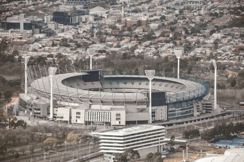 Melbourne Cricket - an aerial view of a soccer stadium in a city