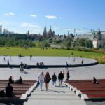 Zaryadye Park - a group of people walking up and down some steps