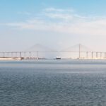 Suez Canal - bridge over the sea under blue sky during daytime