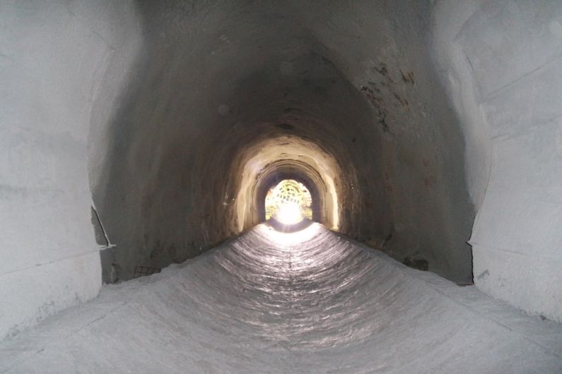 Water Transfer - a tunnel with a light at the end of it