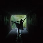 Floating Tunnels - silhouette of woman doing ballet low light photography