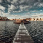 Hammarby Sjöstad - a long dock sitting in the middle of a body of water