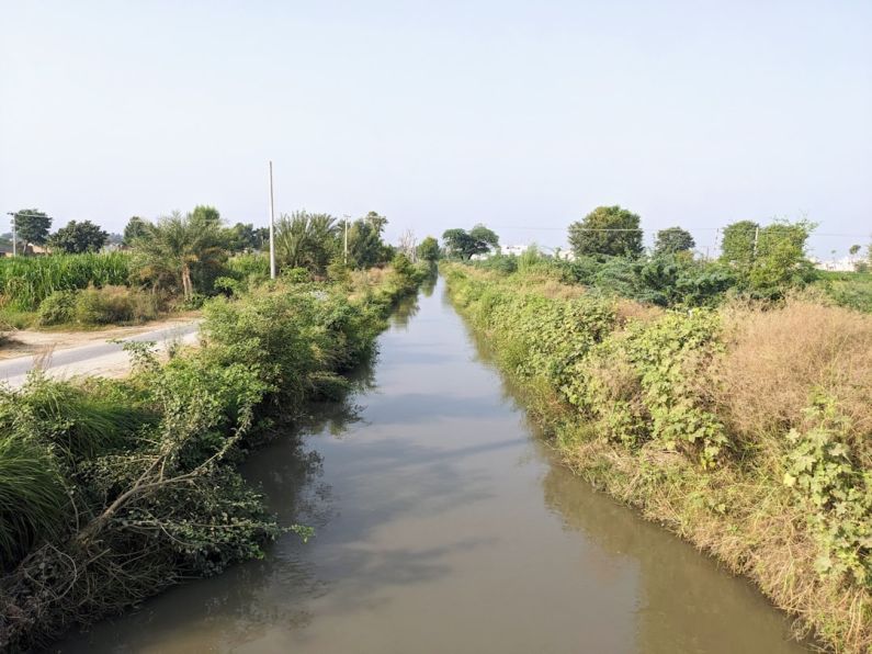 Urban Hydropower - a river running through a lush green countryside