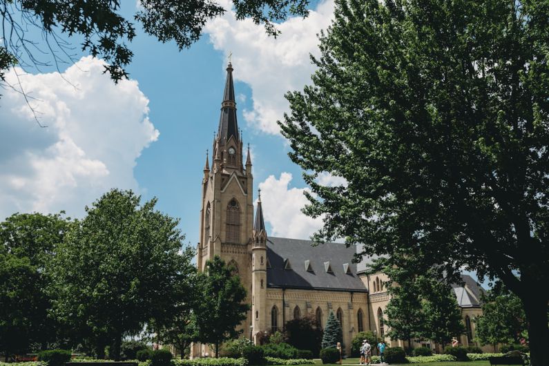 Notre-Dame Reconstruction - a church with a tall steeple