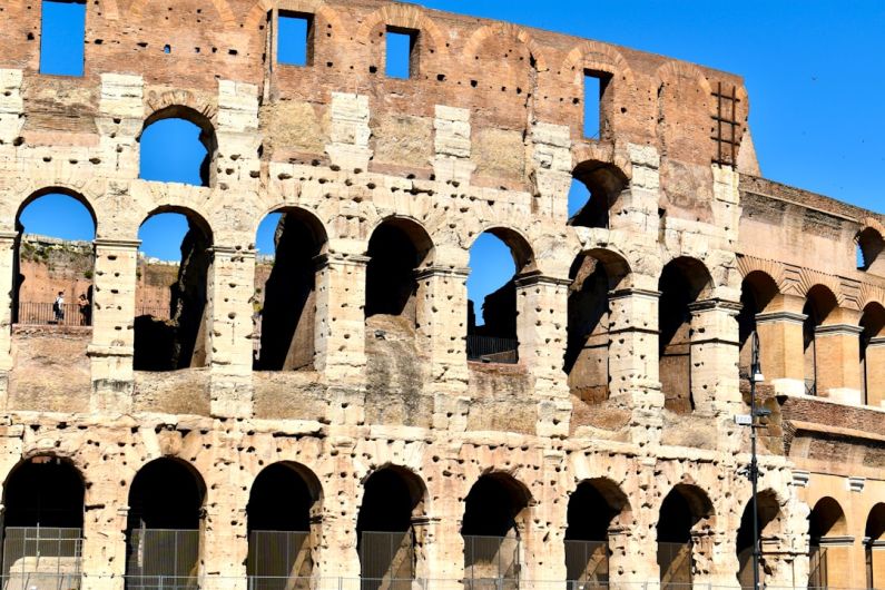 Restored Colosseum - brown concrete building during daytime