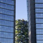 Vertical Forest - a couple of tall buildings sitting next to each other