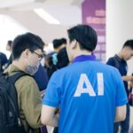 Airport AI - man in blue crew neck t-shirt standing near people