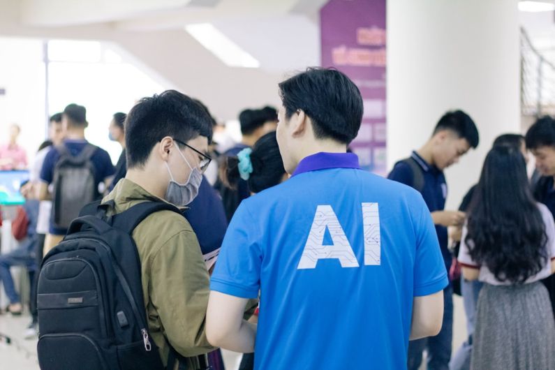 Airport AI - man in blue crew neck t-shirt standing near people