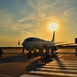 Hyperloop Airport - white airplane parked during daytime