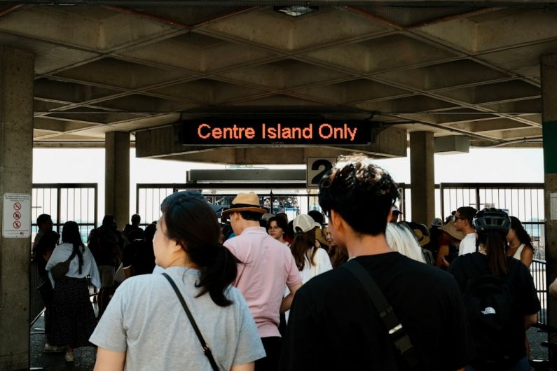 VR Airport - a group of people standing under a bridge