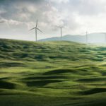 Sustainable Energy - wind turbine surrounded by grass