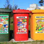 Waste Management - red yellow and green trash bins