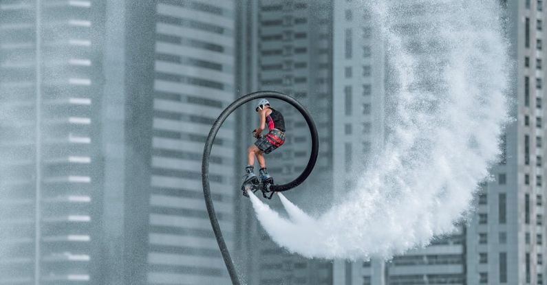 Jetpack - Man in Red Jacket Riding Bicycle on White Water Wave